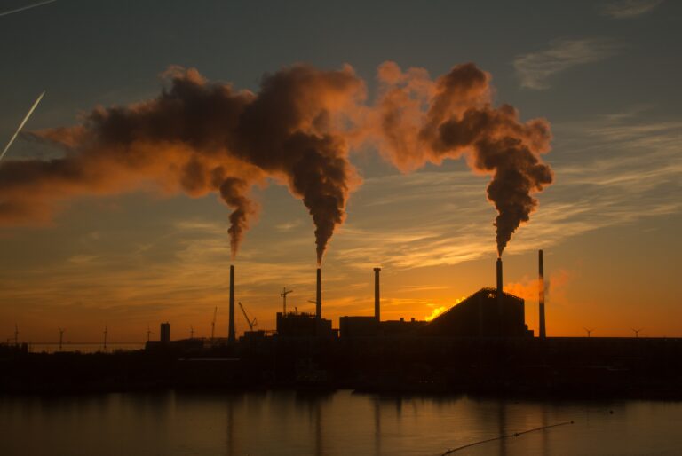 Coal Plant with smoke sunset